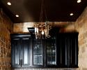 Eye-Catching Backsplash with Black Cabinetry